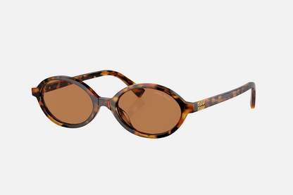 Óculos de Sol Miu Miu 04ZS Havana claro com lentes marrons — vista inclinada principal